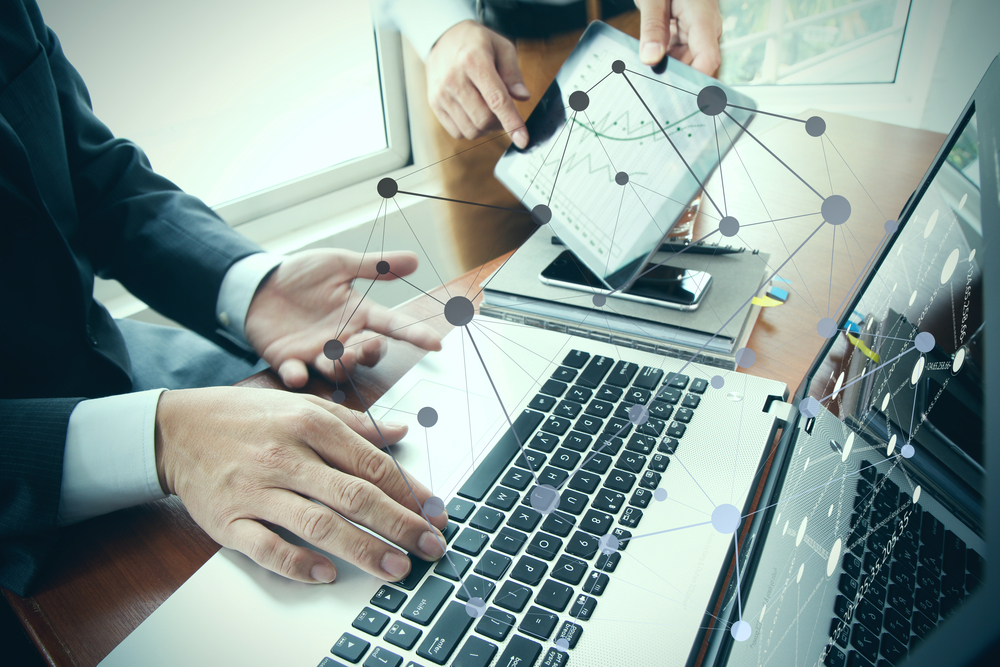 Office professionals working on a laptop